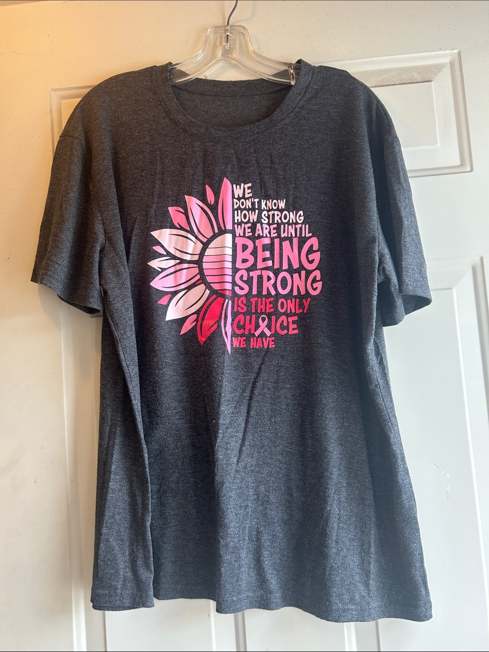 Women’s Charcoal Graphic Tee with Pink Sunburst Breast Cancer Survivor Message